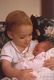 Vanessa (17 months) is holding Regina (4 days).
April 23,1984